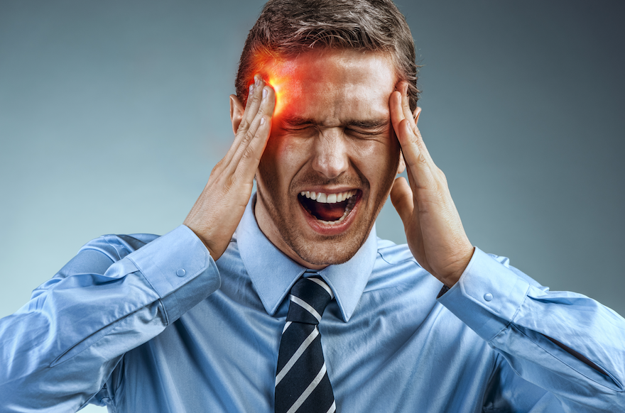 Man with splitting headache