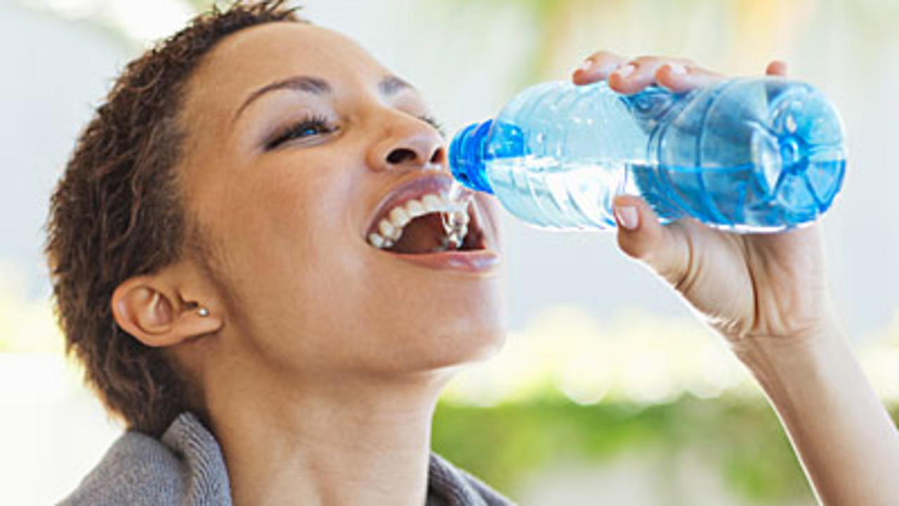 Women drinking water to stay hydrated