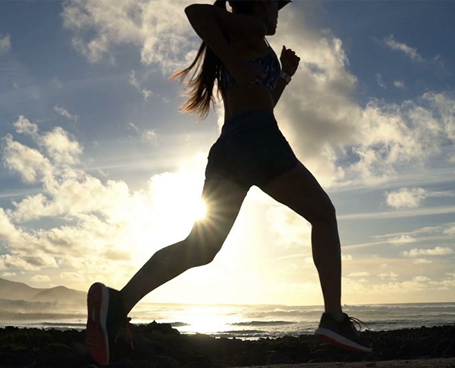 Women running on the beach