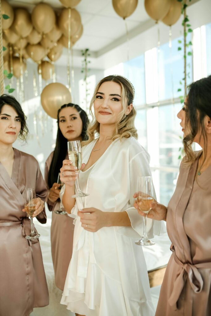 Three ladies celebrating the bride at a bachelorette party